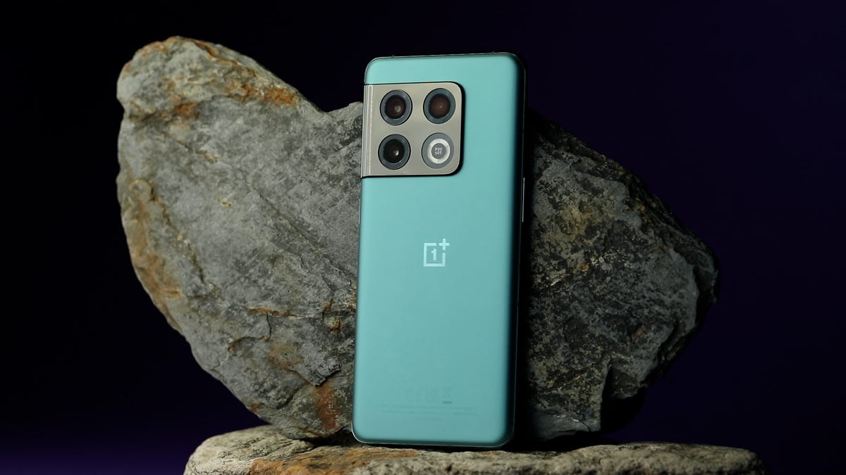 The OnePlus 10 Pro leaning against a rock