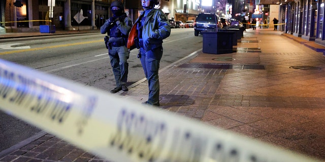 Police block a downtown street following a protest, Saturday, Jan. 21, 2023, in Atlanta, in the wake of the death of an environmental activist killed after authorities said the 26-year-old shot a state trooper. 
