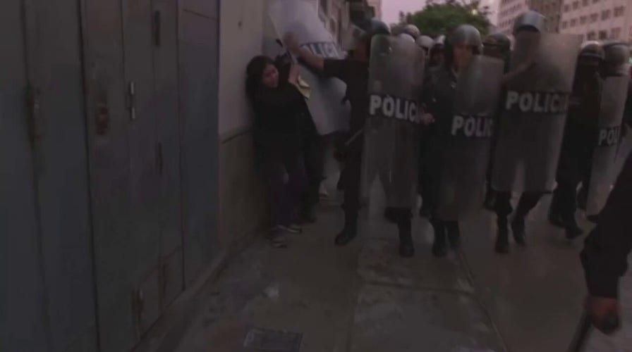 Supporters of ousted Peruvian president clash with police.
