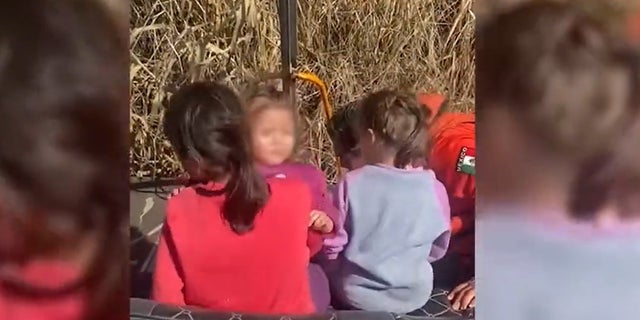 Still image from a video released by the Mexican National Institute of Migration showing the rescue of three sisters abandoned at the border.