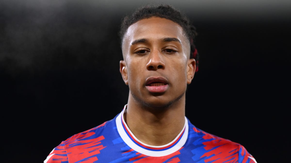 Crystal Palace midfielder Michael Olise looking towards the camera.