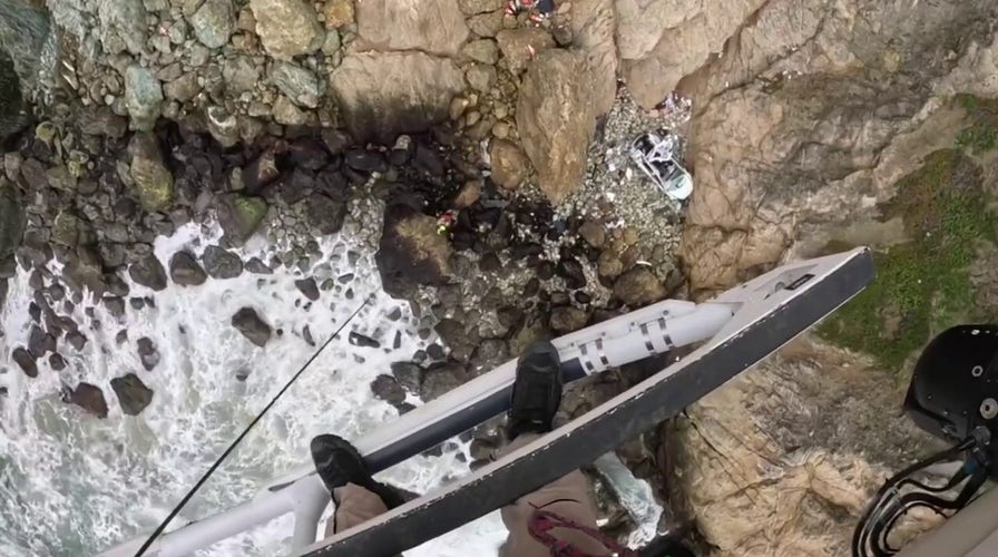 California fire agencies rescue adults via helicopter after Tesla plunges off cliff