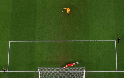 Martinez saves the penalty of Dutch captain Virgil van Dijk early in the shootout. Martinez made two saves in the shootout, which finished 4-3 for Argentina.