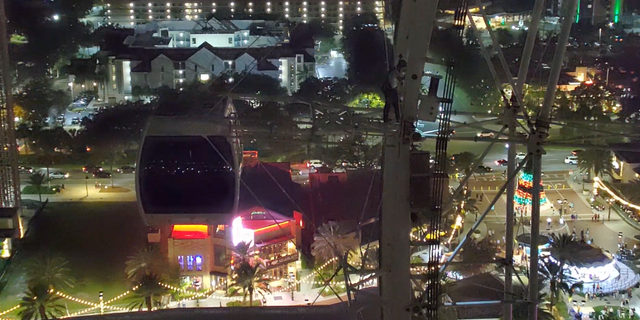 Crews with the Orange County Fire Rescue were forced to manually rotate the attraction in order to evacuate people from the Ferris wheel pods, a spokesperson for the department told FOX 35.