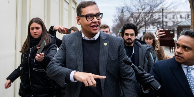 Rep. George Santos, R-N.Y., leaves a meeting of the House Republican Conference at the Capitol Hill Club Wednesday, Jan. 25, 2023. 