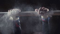 balance beam gymnast hands STOCK