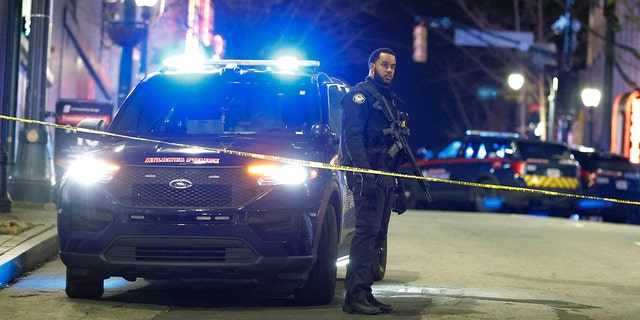 Police block downtown streets following a protest on Saturday in Atlanta, in the wake of the death of an environmental activist killed after authorities said the 26-year-old shot a state trooper. 