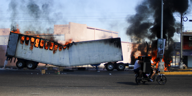 Mayhem on the streets of Culiacan, Sinaloa state, as Mexican authorities captured the son of "El Chapo" Guzmán on Thursday, Jan. 5.