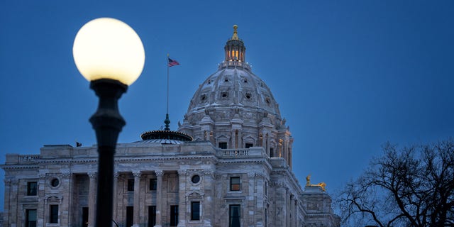 The Minnesota State Capitol was illuminated Tuesday morning as the 2023 Legislative session convenes Jan. 3, 2023, with Democrats officially taking full control of state government and with a nearly $18B surplus to spend.