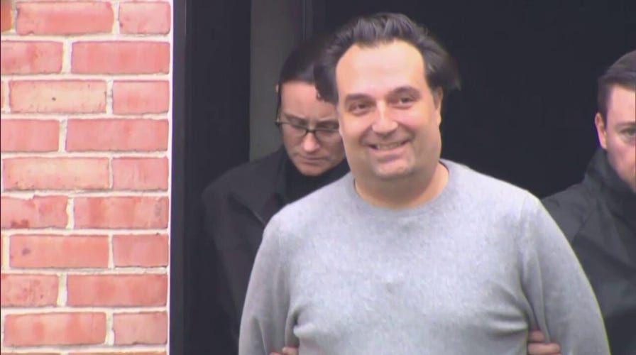 Brian Walshe smiles outside of district court 