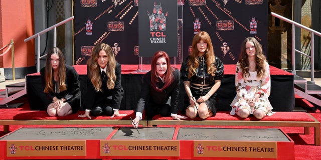 (L-R) Harper Vivienne Ann Lockwood, Lisa Marie Presley, Priscilla Presley, Riley Keough, and Finley Aaron Love Lockwood attend the Handprint Ceremony honoring Three Generations of Presley's at TCL Chinese Theatre on June 21, 2022 in Hollywood, California. (Photo by Axelle/Bauer-Griffin/FilmMagic)