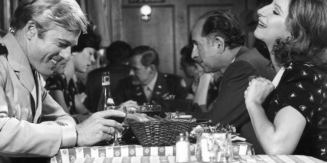Robert Redford, left, was not interested in playing a "Ken doll" and wondered if his leading lady would be difficult on set.