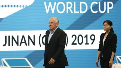 Zhou (right) attends the opening ceremony of the 2019 Swimming World Cup in Jinan, China. 