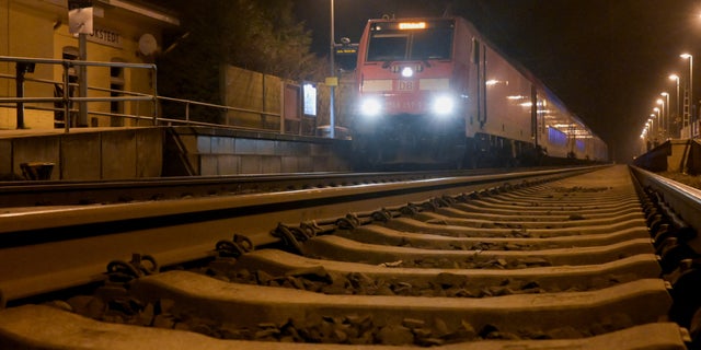 A train stands at a station in Brokstedt, Germany, after an incident involving a knife attack took place while the train was traveling between Kiel and Hamburg on Jan. 25, 2023.