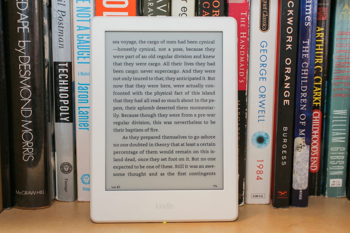Kindle in front of books