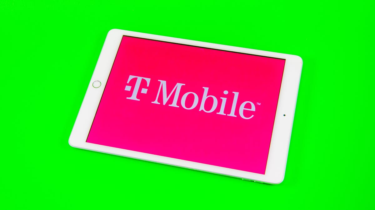 T-Mobile logo on a tablet against a bright green background