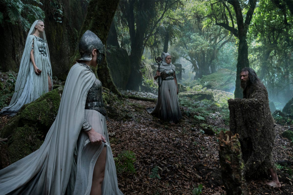 The stranger in the woods with the creeps in the white robes.