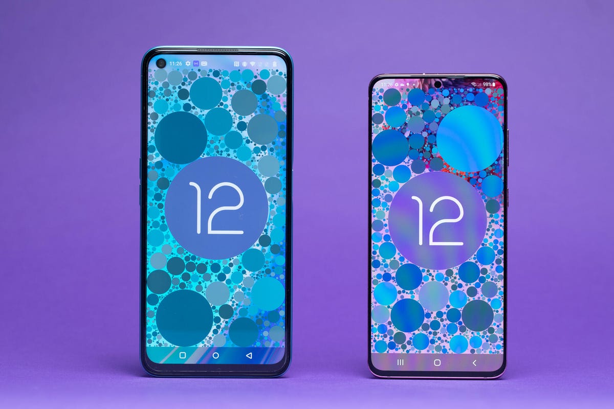 OnePlus Nord CE 2 Lite next to Samsung Galaxy S20 showing wallpaper saying 12