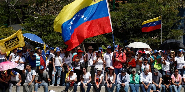 Anti-government protesters gather for a rally to demand the resignation of Venezuelan President Nicolás Maduro in Caracas, Venezuela.