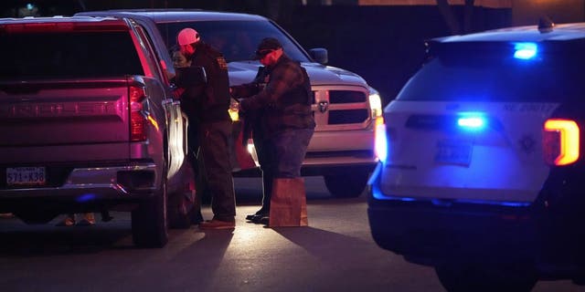Las Vegas police work near the home of former actor Nathan Lee Chasing His Horse, who goes by Nathan Chasing Horse, Tuesday, Jan. 31, 2023, in North Las Vegas, Nevada.