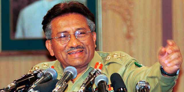 Pakistan's former President Pervez Musharraf gestures at a news conference on March 23, 2000, in Islamabad. Musharraf has died at the age of 79. His funeral was held on Tuesday.