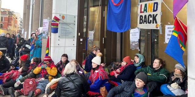 Greta Thunberg attends a demonstration against the Fosen wind turbines not being demolished, which was built on land traditionally used by indigenous Sami reindeer herders, with environmental and Sami rights activists blocking the entrances to the Ministry of Oil and Energy, in Oslo, Norway, Feb. 27, 2023. 