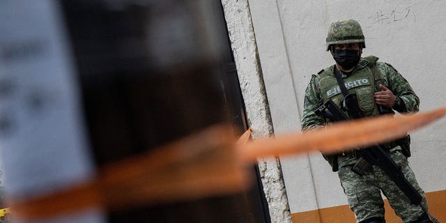 A soldier patrolling the area on Aug. 16, 2022, in Mexico City, Mexico. 