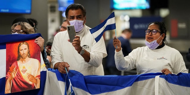Activists await the arrival of some of the more than 200 political prisoners from Nicaragua at Dulles International Airport in Virginia outside Washington, U.S., after being released and flown to the United States February 9, 2023. 