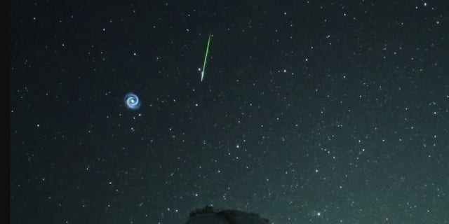 The spiral moved quickly through the sky.