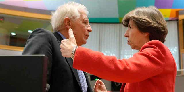 European Union foreign policy chief Josep Borrell, left, speaks with Frances Foreign Minister Catherine Colonna during a meeting of EU foreign ministers in Brussels on March 20, 2023. Colonna announced that hopes Sweden and Finland's NATO bids will be "ratified quickly."