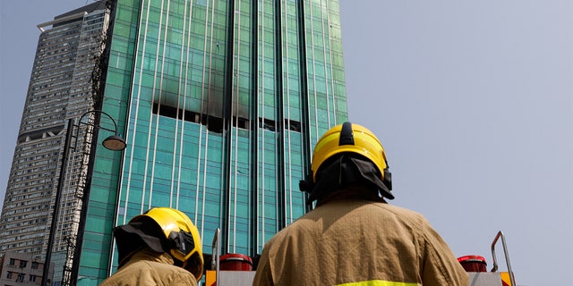 An under-construction skyscraper is seen after a blaze is put out at Tsim Sha Tsui in Hong Kong March 3, 2023.