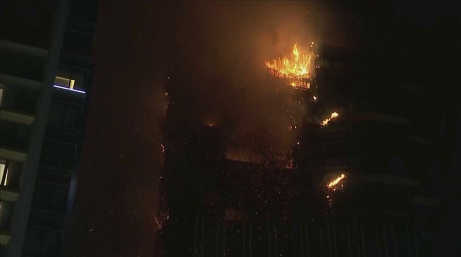 Massive Hong Kong fire consumes skyscraper under construction