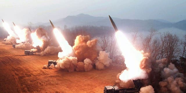 An artillery drill at an undisclosed location in North Korea, Thursday, March 9, 2023.
