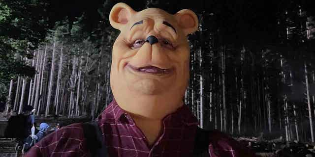 An image from "Winnie the Pooh: Blood and Honey" is shown above. Public screenings of the film in Hong Kong have been scrapped.