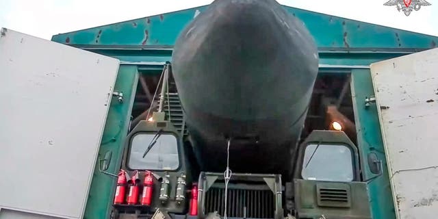 This photo made from video provided by the Russian Defense Ministry Press Service on Wednesday, March 29, 2023, shows a Yars missile launcher of the Russian armed forces being driven from a shelter in an undisclosed location in Russia.