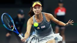 BEIJING, CHINA - SEPTEMBER 28:  Peng Shuai of China returns a shot against Daria Kasatkina of Russia during the women's singles first round match of 2019 China Open at the China National Tennis Center on September 28, 2019 in Beijing, China.  (Photo by Lintao Zhang/Getty Images)