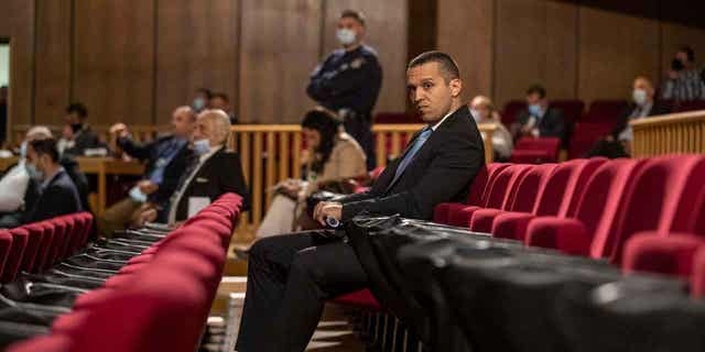 IIias Kasidiaris, former lawmaker who was a leading member of an extreme right party, Golden Dawn, looks on during a trial in Athens, Greece, on Oct. 21, 2020. Kasidiaris has stepped down as leader of the newly-formed Greeks Party, it announced on April 7, 2023.