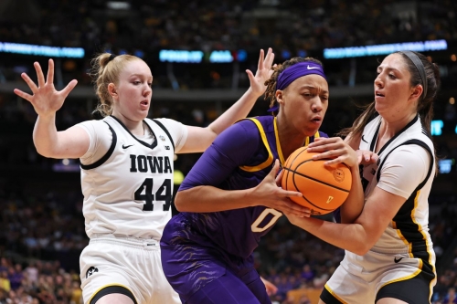 LSU's LaDazhia Williams is defended in the first half.