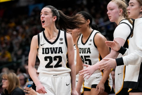 Clark yells from the sideline during the first half. She was in foul trouble for much of the game.