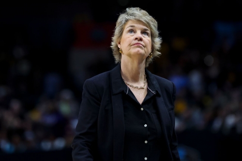 Iowa head coach Lisa Bluder walks the sideline during the first half.