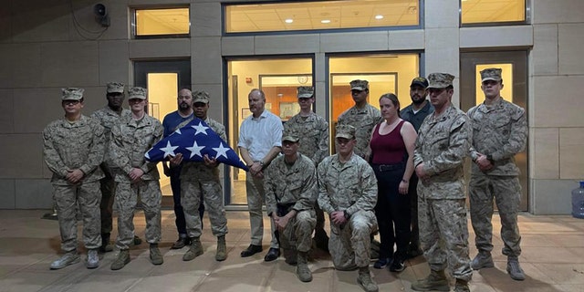 Marines pose with US ambassador at US embassy in Sudan