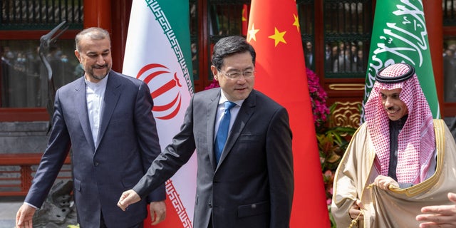 Iranian Foreign Minister Hossein Amir-Abdollahian, left, Saudi Arabia's Foreign Minister Prince Faisal bin Farhan Al Saud and Chinese Foreign Minister Qin Gang, middle, during their meeting in Beijing April 6, 2023.