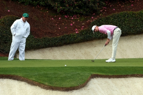 Sam Bennett watches his putt on the 12th green during the  third round on Sunday.