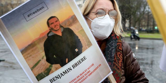 woman with poster