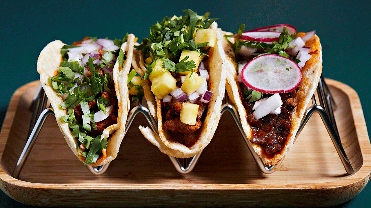 Three tacos on a plate