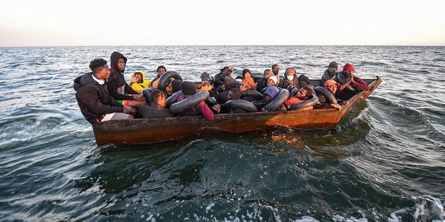 migrants adrift on boat