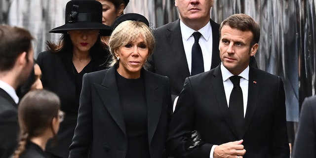 French President Emmanuel Macron and his wife Brigitte arrive at Westminster Abbey wearing all black for Queen Elizabeths state funeral