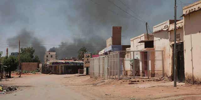 Smoke rises in Khartoum