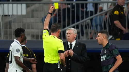 Ancelotti is yellow carded on the sidelines against Manchester City. 
