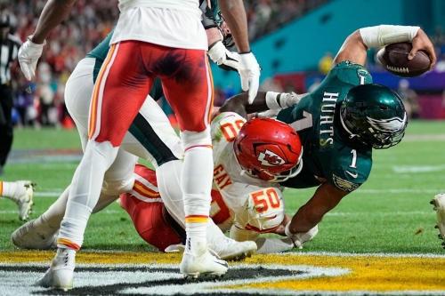 Hurts scores a two-point conversion to tie the game at 35-35 in the fourth quarter. Hurts finished the game with three rushing touchdowns and one passing touchdown.